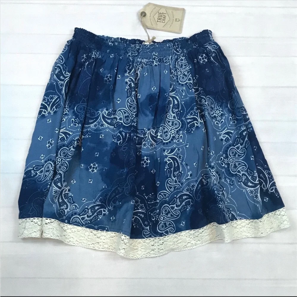 True Craft navy paisley print with cream woven lace trim skirt